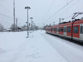 Train on railroad tracks during winter