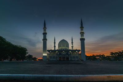 View of temple building against sky during sunset