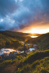Scenic view of landscape against sky during sunset