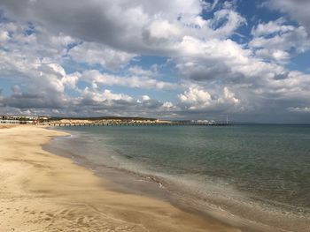 Scenic view of beach against sky