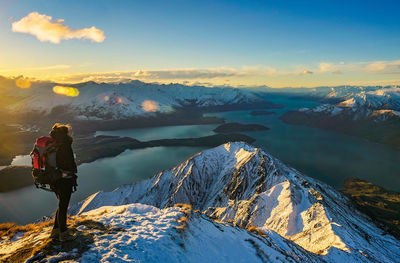 Scenic view of snow covered mountains against sky