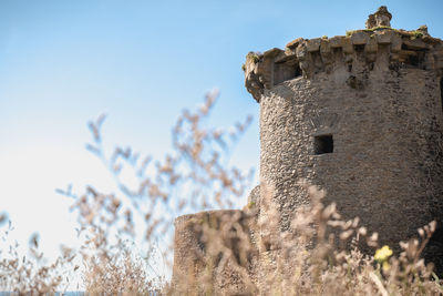 Low angle view of old building against sky