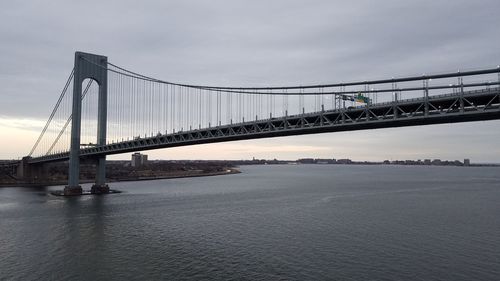 View of suspension bridge over sea