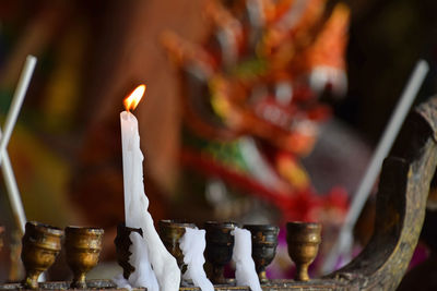 Close-up of burning candle