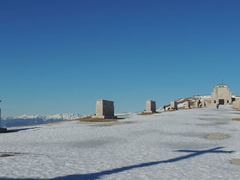 View of historical building against clear blue sky