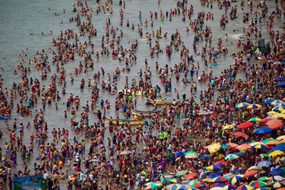High angle view of people on beach with in chorillos, lima
