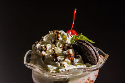 Close-up of ice cream against black background