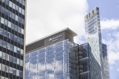 Low angle view of modern building against sky