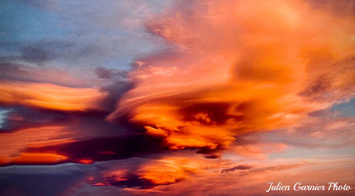 Low angle view of dramatic sky during sunset