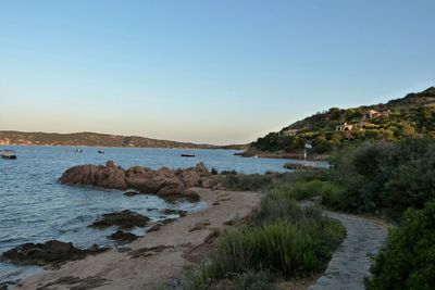 View of calm blue sea against clear sky