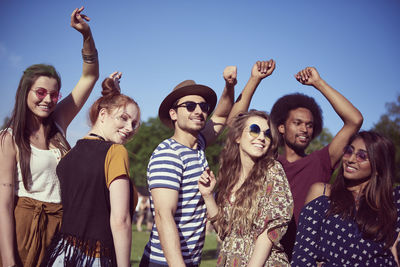 Group of people at party during sunny day