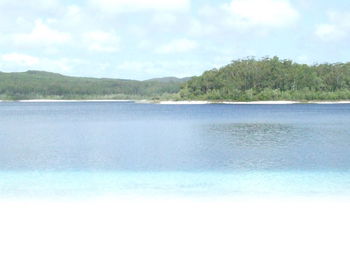 Scenic view of calm sea against sky