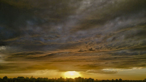 Scenic view of dramatic sky during sunset