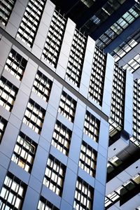 Low angle view of modern buildings against sky