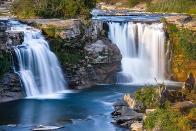 Scenic view of waterfall in forest