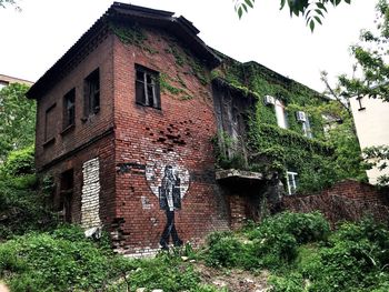 Low angle view of old building against sky