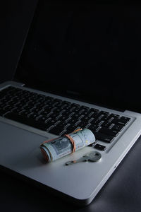 High angle view of laptop keyboard on table