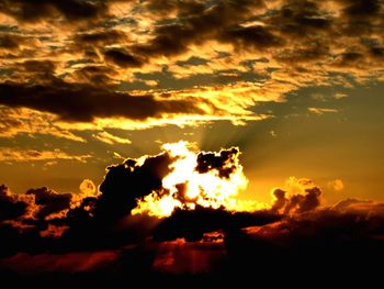 Low angle view of dramatic sky during sunset