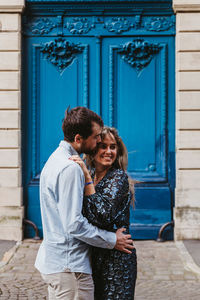 Young couple standing outdoors