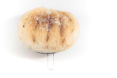 High angle view of bread against white background