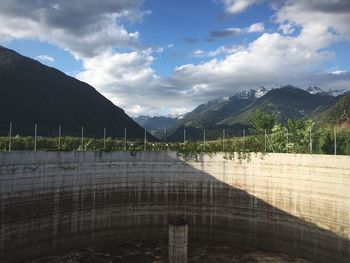 Scenic view of dam against sky