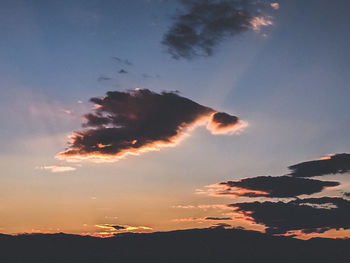 Low angle view of silhouette mountain against sky during sunset