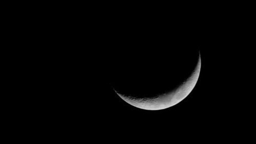 Scenic view of moon against sky at night