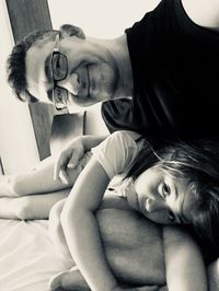 Portrait of father with daughter at home