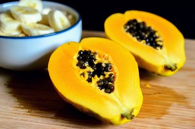 Close-up of papaya fruits in plate on table