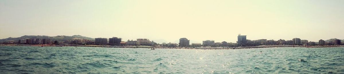 View of cityscape with sea in background