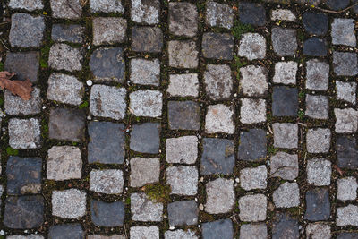 High angle view of stone on footpath