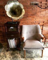 Table and chairs against wall at home