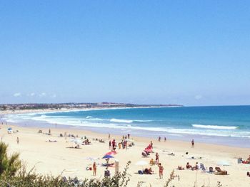 People enjoying at beach