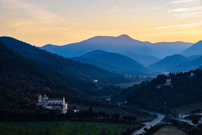 Scenic view of mountains against sky during sunset