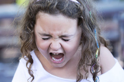 Close-up of girl with eyes closed