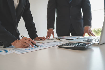 Low section of people on table