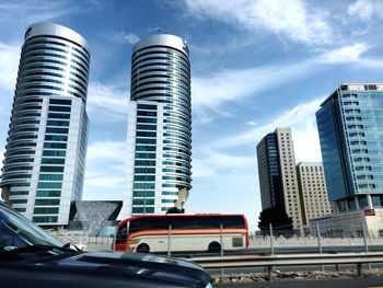 Modern buildings against sky in city