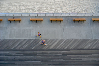 High angle view of people on wall