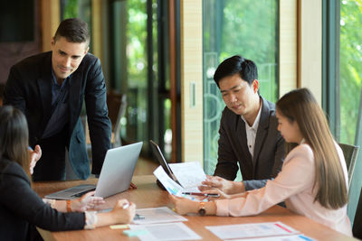 Business people having discussion at office