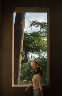 Woman walking in corridor