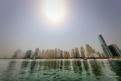 Buildings in city at waterfront