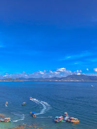 Scenic view of sea against blue sky