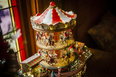 Close-up of illuminated christmas decorations on table