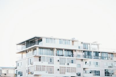 Residential buildings against clear sky