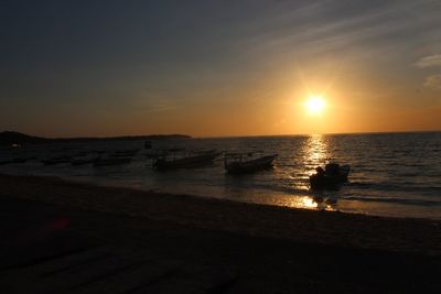 Scenic view of sea at sunset