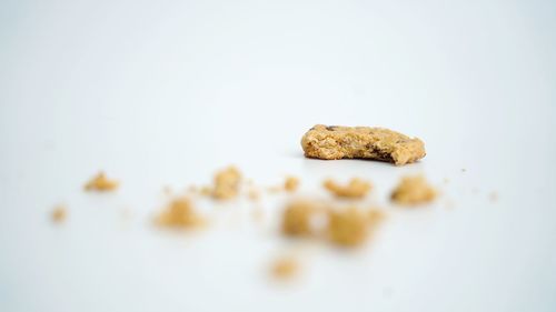 Close-up of cookies against white background