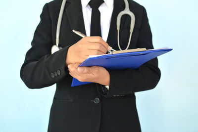 Close-up of man with stethoscope