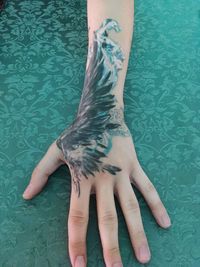 High angle view of woman legs in swimming pool