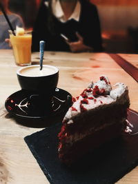 Close-up of cake served on table