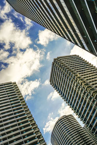 Low angle view of modern buildings against sky